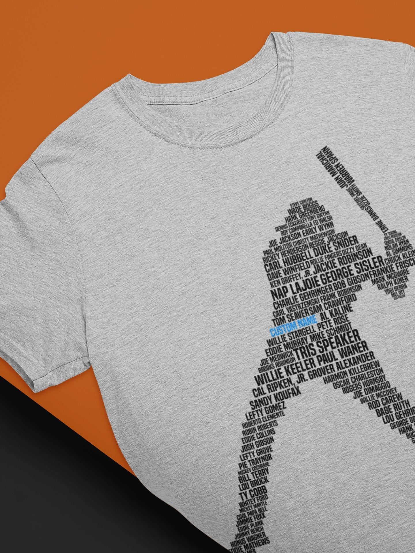 Custom baseball shirt depicting a baseball batter (hitter) who&#39;s shape is made out of famous baseball players like BabeRuth, Mickey Mantel, Joe Dimaggio and other hall of famers.